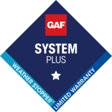 The GAF System Plus logo. A dark blue diamond with the GAF logo at top (the letters G-A-F in white on a red square) and the words System plus in capital letters in white. Along the bottom edges of the diamond are lighter blues with the words Weather Stopper and Limited Warranty in white.