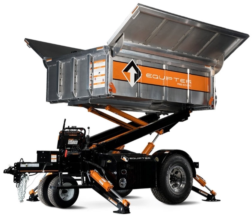 An Equipter machine in black, natural metal and safety orange is seen against a white background. The machine sits on a tricycle-style black trailer, and a large steel box is raised on hydraulic lifters so that roofers can dispose of roofing debris into it.